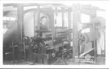 SA0462b - A Shaker Sister working at a loom. Identified on the front.